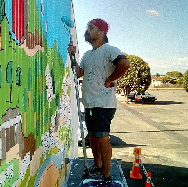 Brian Gonnella working on a mural in New Zealand - PHOTO: NICHOLAS NICKELBY