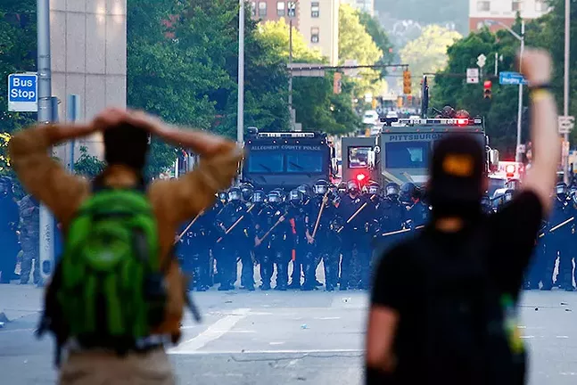 George Floyd protesters clash with police and SWAT near the intersection of Centre and Negley avenues following a peaceful protest in East Liberty on Mon., June 1, 2020 - CP PHOTO: JARED WICKERHAM