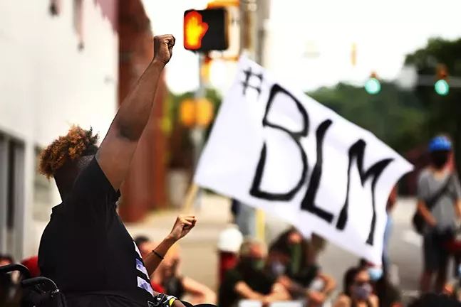 Protesters organized by the group “Pittsburgh I Can’t Breathe” march through East Liberty on Fri., June 26. - CP PHOTO: JARED WICKERHAM