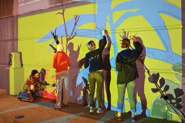 Previous public art by Riverlife: mural painters under the Fort Duquesne Bridge in 2015 - PHOTO: COURTESY OF RIVERLIFE