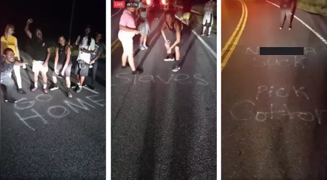 Marchers pose with racist graffiti on the highway outside of McConnellsburg, Pa. on Aug. 26. (Photo has been censored.) - SCREENSHOTS TAKEN FROM FACEBOOK