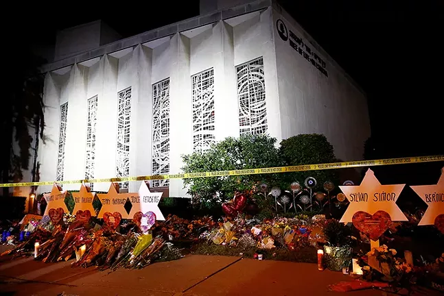 Star of David memorials, laid with flowers at the Tree of Life synagogue two days after a mass shooting in Pittsburgh in October 2018 - CP PHOTO: JARED WICKERHAM