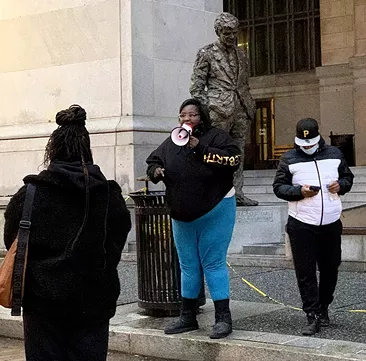 Trans YOUniting founder Dena Stanley speaks to the crowd during a Trans Visibility demonstration in Downtown Pittsburgh on Thu., Oct. 29, 2020. - CP PHOTO: NARDOS HAILE