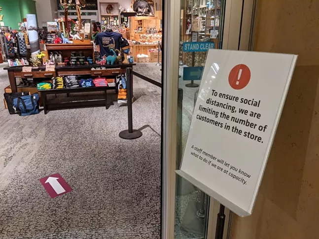 Social distancing signage outside the Carnegie Museum of Natural History gift shop - CP PHOTO: AMANDA WALTZ