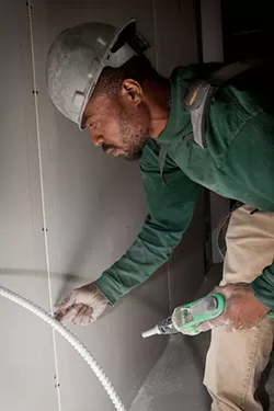 Jermaine Butler, of Homewood, completed the CEA construction training program three years ago and now works carpentry jobs at Ma’at Construction Group. - PHOTO BY HEATHER MULL