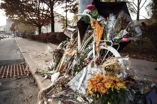 A ghost bike memorial in 2015 marking the spot on Forbes Avenue where cyclist Susan Hicks was killed. - CP FILE PHOTO: THEO SCHWARZ