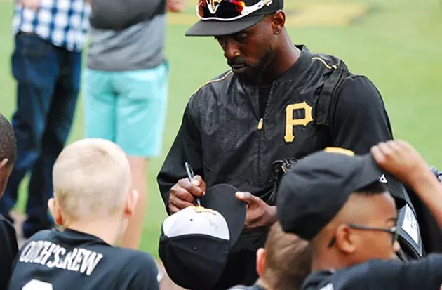 Andrew McCutchen signs autographs for kids at Pirates spring training in Bradenton, Florida - PHOTO BY CHARLIE DEITCH