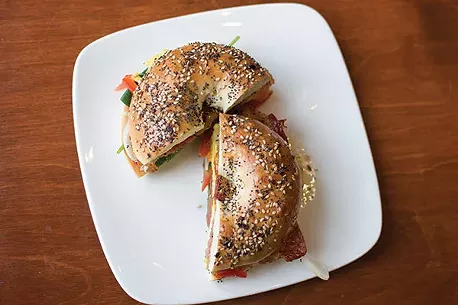 Delanie's Coffee: Breakfast Sandwich from Delanie’s Coffee: everything bagel with bacon, cheese lettuce and tomato - PHOTO BY SARAH WILSON