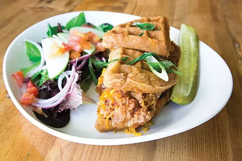 Social: Fried chicken and waffles sandwich from Social: served with cheddar cheese and maple aioli - PHOTO BY JOHN COLOMBO