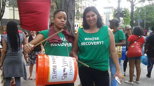 "This is a movement rooted in love for others." Tahira Pratt and Tania Syed, both from New York City, with Center for Public Democracy's Fed Up campaign, which fights for economic justice. - PHOTO BY ASHLEY MURRAY