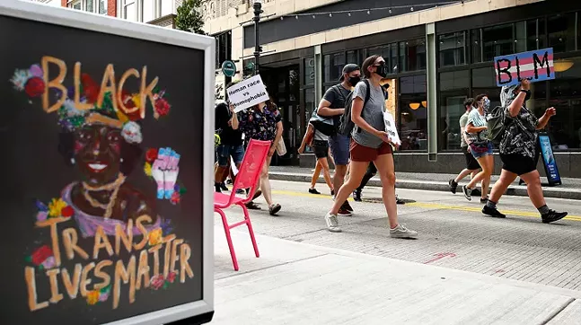 A protest organized by Trans YOUniting marches through Downtown Pittsburgh from the UPMC offices on July 31, 2020 - CP PHOTO: JARED WICKERHAM