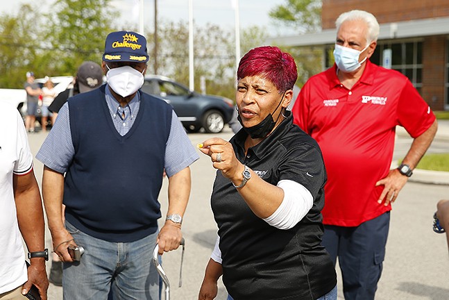 Penn Hills Deputy Mayor Cathy Sapp announcing that Robert Gowans has been fired during a rally and press conference at the Penn Hills Police Department building on Mon., May 17, 2021 - CP PHOTO: JARED WICKERHAM