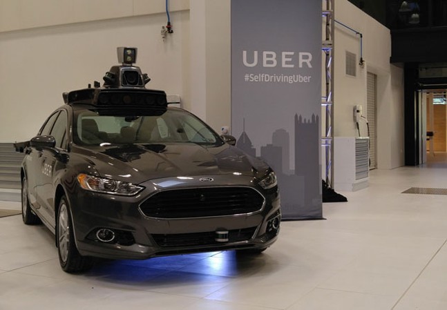 A Ford Focus model of an Uber driverless car - CP PHOTO BY KIM LYONS