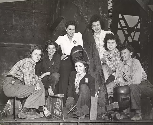 Women Welders at Dravo pose for a group photo, 1943-1944, part of the We Can Do It! WWII exhibit at Heinz History Center — see Mon., June 14 - PHOTO: COURTESY OF DETRE LIBRARY AND ARCHIVES AT THE HEINZ HISTORY CENTER