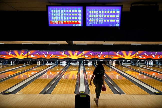 Players bowl during the Stonewall Sports bowling league at the AMF Noble Manor Lanes. - CP PHOTO: JARED WICKERHAM