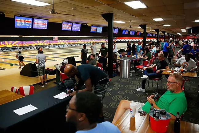 Players bowl during the Stonewall Sports bowling league at the AMF Noble Manor Lanes. - CP PHOTO: JARED WICKERHAM