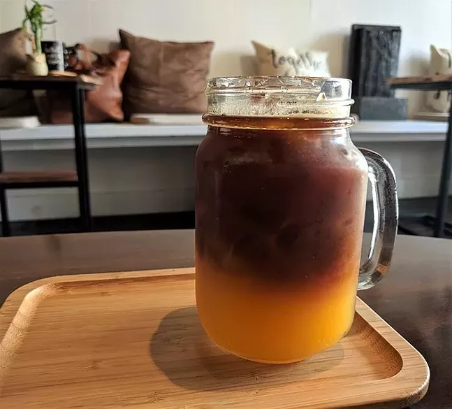 Orange Freshpresso: A shot of espresso over fresh-squeezed orange juice at Ka-Fair Coffee - CP PHOTO: MAGGIE WEAVER