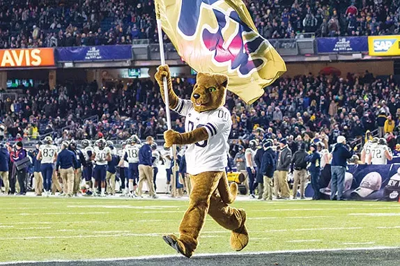 Pitt’s Mascot runs through the endzone at Yankee Stadium Dec. 28 in front of a sea of Pitt fans who travelled to support their team - PHOTO COURTESY OF UNIVERSITY OF PITTSBURGH ATHLETICS MEDIA RELATIONS