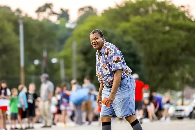 People dance to music in the Dormont Pool Parking lot during the Fourth of July Celebration. - CP PHOTO: KAYCEE ORWIG