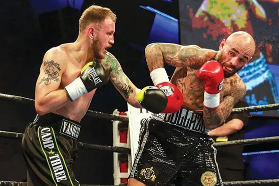 Monessen’s Sammy Vasquez, left, takes on Luis Collazo Feb. 2 in Tunica, Miss. - PHOTO COURTESY OF RYAN GREENE/PREMIER BOXING CHAMPIONS
