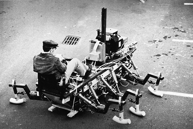 Ivan Sutherland demonstrates the Trojan Cockroach, a walking machine developed by Sutherland and his team at Carnegie Mellon University in the 1980s - PHOTO: COURTESY OF CARNEGIE MELLON UNIVERSITY