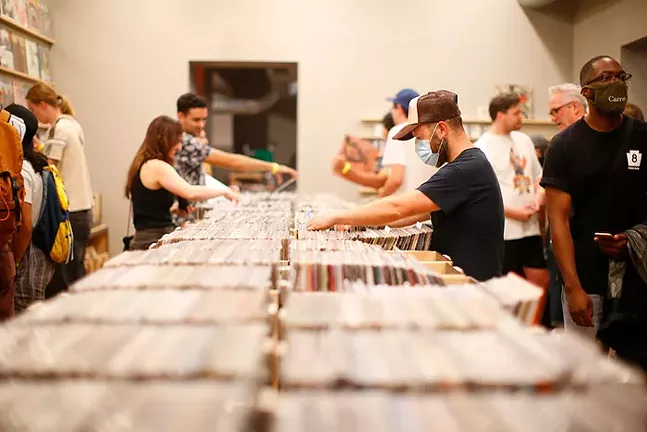 Customers browse records in the Government Center.  - CP-PHOTO: JARED WICKERHAM