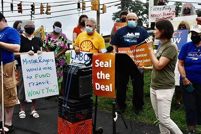 Laura Chu Wiens, Executive Director of Pittsburghers for Public Transit, speaks during a #SealTheDeal rally. - PHOTO: TOM HOFFMAN