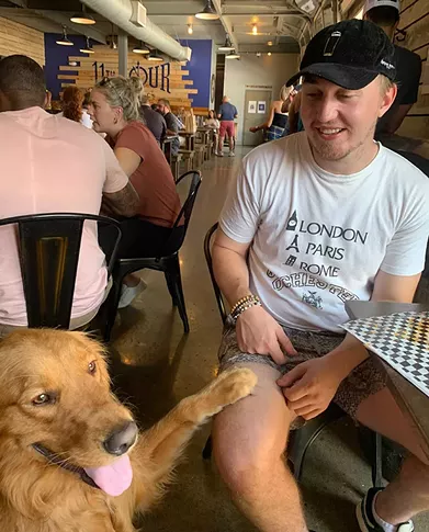 Owen Gabby and Archer, Eleventh Hour's brewery dog, become new BFFs.  - CP PHOTO: ALEX KILYANEK