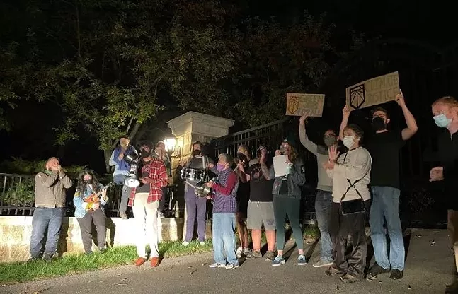 Activists rally outside Sewickley home of Sen. Joe Manchin’s daughter in support of reconciliation bill