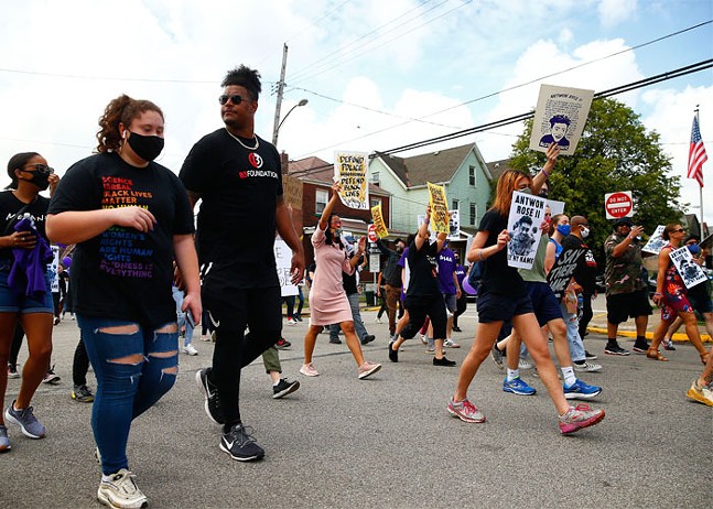 Pittsburgh Steelers offensive tackle Zach Banner walks in a June 2020 march to mark the two-year anniversary of the death of Antwon Rose II, a 17-year-old shot by an East Pittsburgh police officer. - CP PHOTO: JARED WICKERHAM