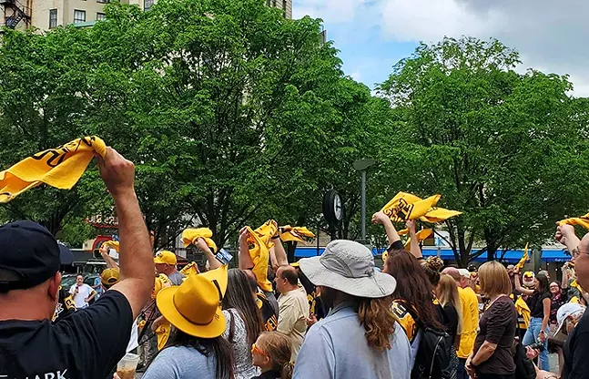 Hockey fans cheer on the Pittsburgh Penguins during a playoff rally in Downtown Pittsburgh on Fri., May 13, 2022. - CP PHOTO: LUCY CHEN