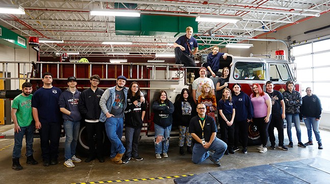 Connellsville Area Career & Technical Center Protective Services students pose for a group photo with their teacher, Ron Barry, on Tue., May 17, 2022 in Connellsville, Pa. - CP PHOTO: JARED WICKERHAM