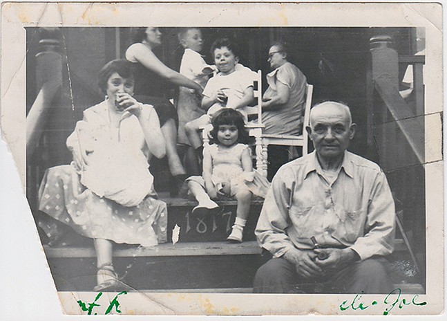 Tito and Mecca family members sitting on the front steps of 1817 Fifth Avenue - PHOTO COURTESY OF DONNA BRUSCO