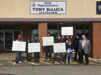 Immigrant-rights advocates protesting outside of state Rep. Tony DeLuca's office in Penn Hills - PHOTO COURTESY OF THOMAS MERTON CENTER