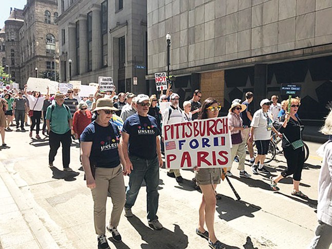 Pittsburghers protest the Paris Agreement withdrawal on June 3. - CP PHOTO BY BILL O’DRISCOLL