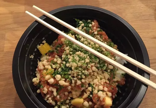 Poke bowl with spicy tuna, white rice, mango, kale, cucumber, nori and tempura flakes, spicy mayo and house poke sauce - CP PHOTO BY LISA CUNNINGHAM