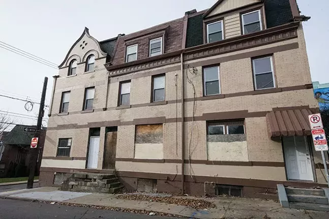 This series of vacant rowhouses on Gist Street has been owned by Bob Eckenrode since 2005. The façades were recently given a new coat of paint. - CP PHOTO BY JAKE MYSLIWCZYK