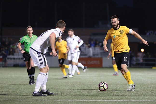 Pittsburgh Riverhounds captain Kevin Kerr (right) - PHOTO COURTESY OF CHRIS COWGER