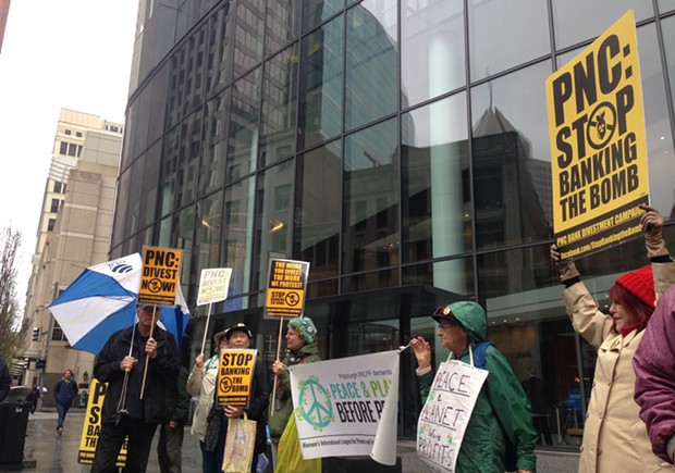 Anti-nuclear weapons protesters outside of PNC Tower on April 24 - CP PHOTO BY RYAN DETO