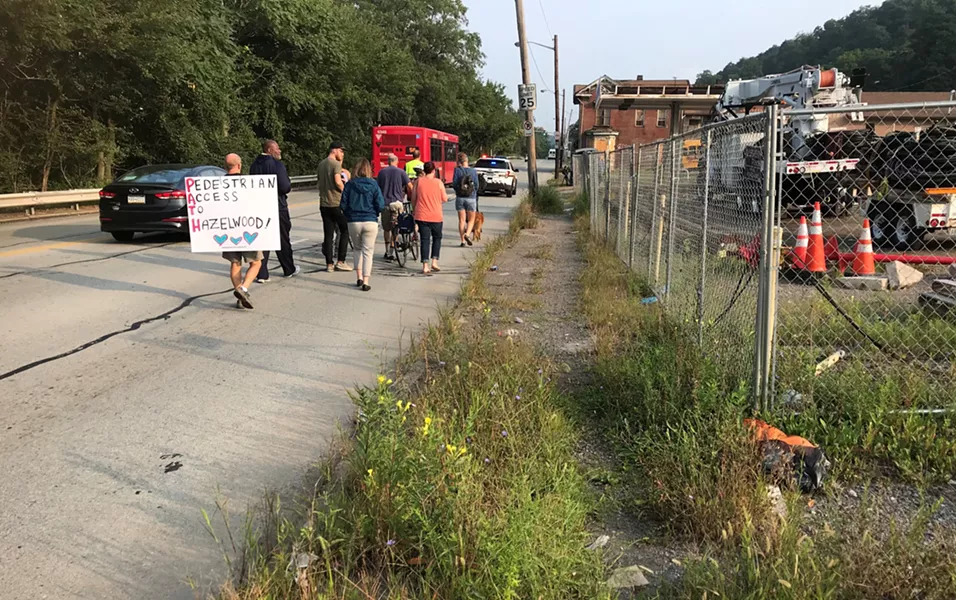 Marchers on Irvine Avenue in Hazelwood - CP PHOTO BY RYAN DETO
