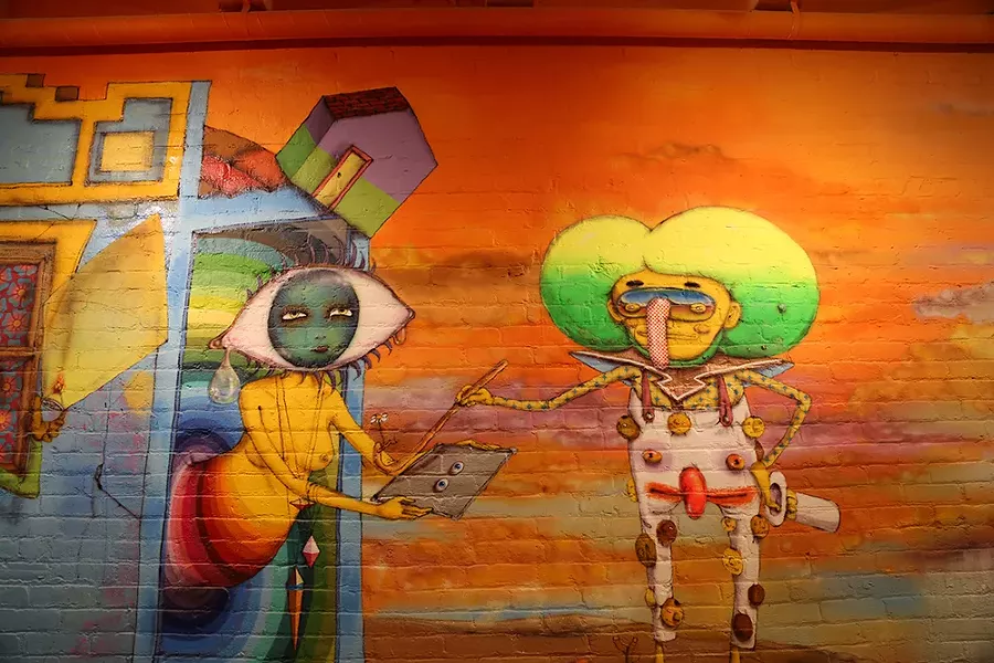 Artwork by OSGEMEOS - DAVID BERNABO