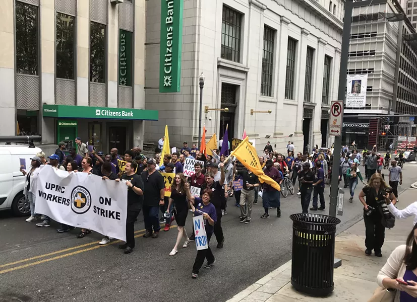 UPMC workers marching Downtown during their one-day strike - CP PHOTO: RYAN DETO