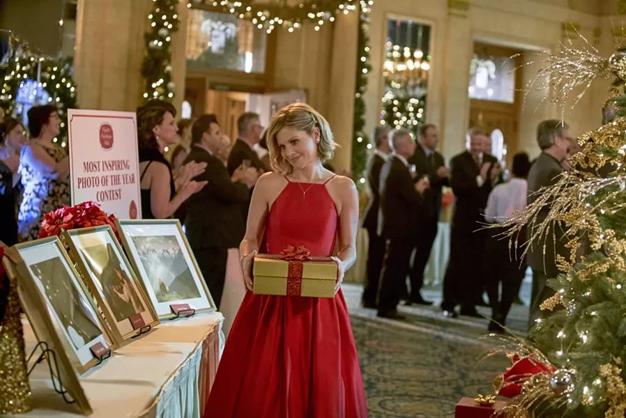 Candace Cameron Bure as a shoe addict/terrible photographer. - CROWN MEDIA