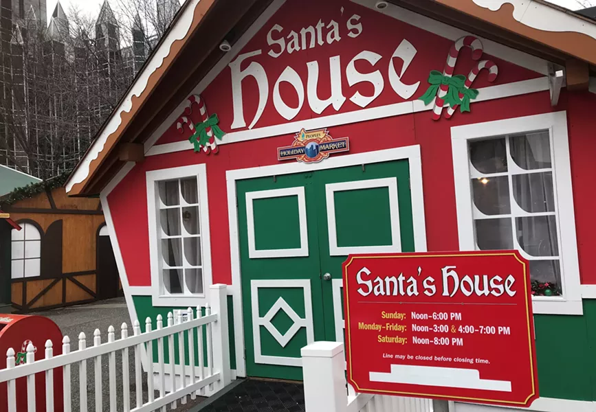 Colcom Foundation name taped over at Santa's House at Holiday Market - CP PHOTO: RYAN DETO