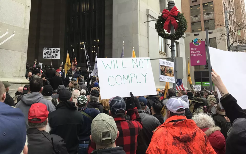 Gun-rights protesters outside of City-County Building in Downtown - CP PHOTO: RYAN DETO