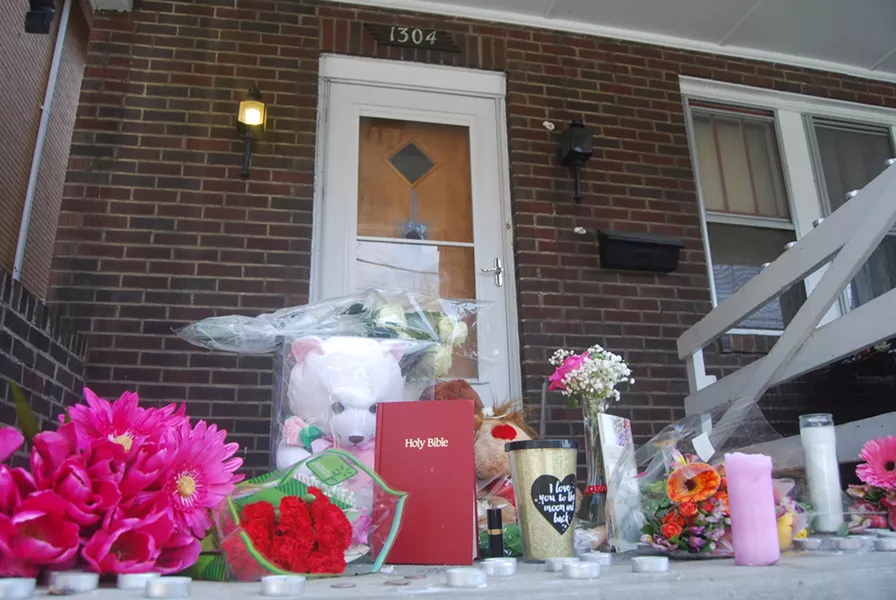 A memorial at the scene of the March 9 mass shooting in Wilkinsburg - PHOTO BY RYAN DETO