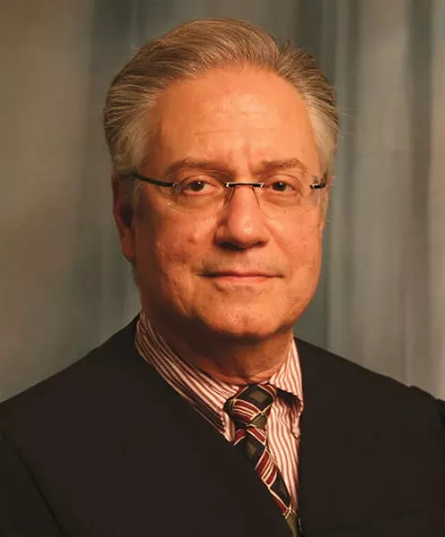 JUDGE LESTER NAUHAUS