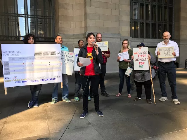 Laura Wiens speaks at a rally protesting the Mon-Oakland Connector - CP PHOTO: RYAN DETO
