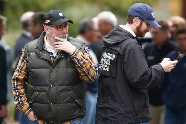 Bill Peduto (left) after the Tree of Life shooting in 2018 - CP PHOTO: JARED WICKERHAM