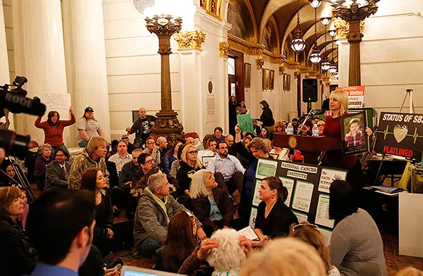 Medical-cannabis proponents staged a sit-in Feb. 8 at the state capitol to protest the stalled legislation. - PHOTO BY JOHN HARVEY